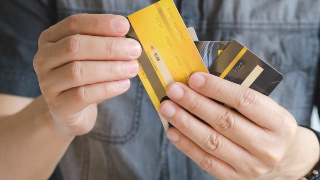 Man choosing the right credit card