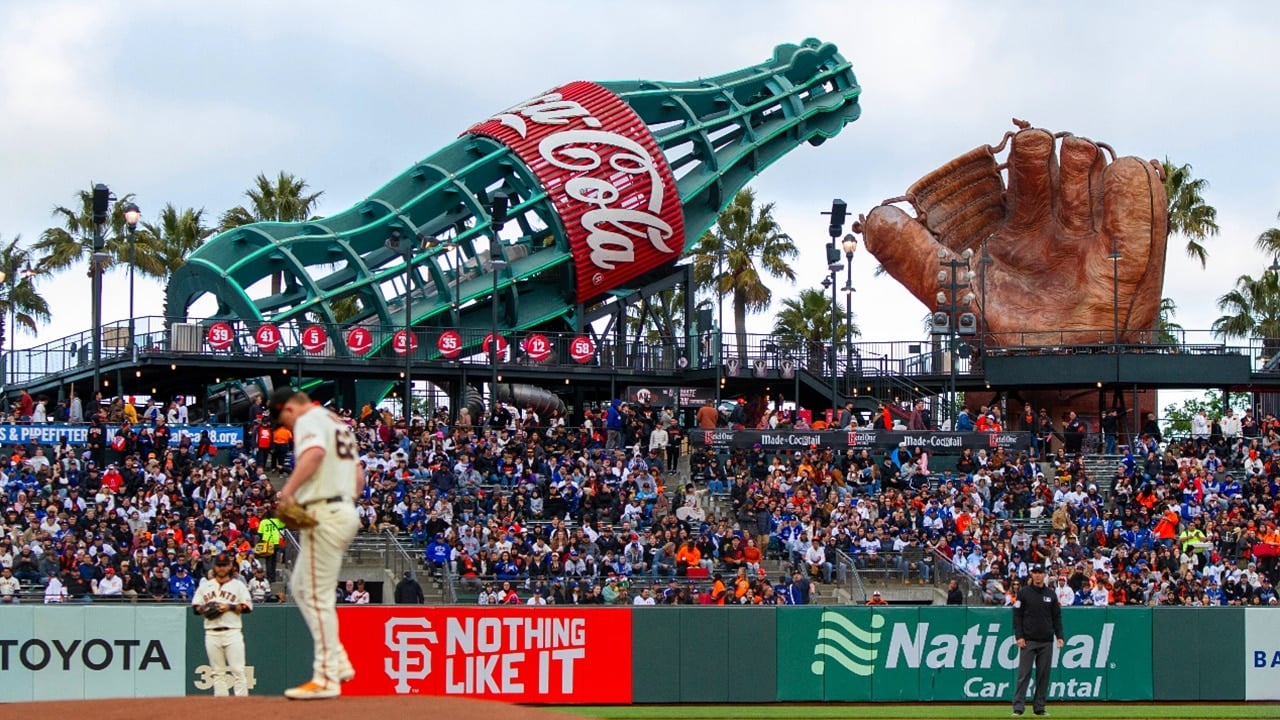 The giant Coca-Cola Bottle and 1927 Old-Time Four-Fingered Baseball Glove during a San Francisco Giants game at Oracle Park
