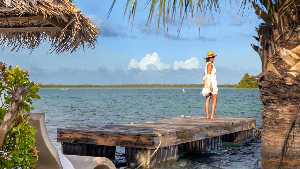 Pine Cay Relais & Chateaux woman on dock