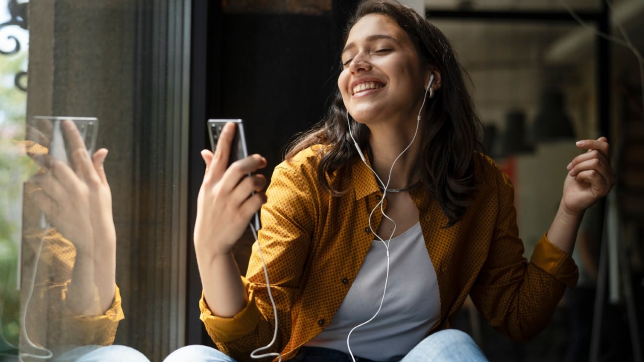 young woman listening to music