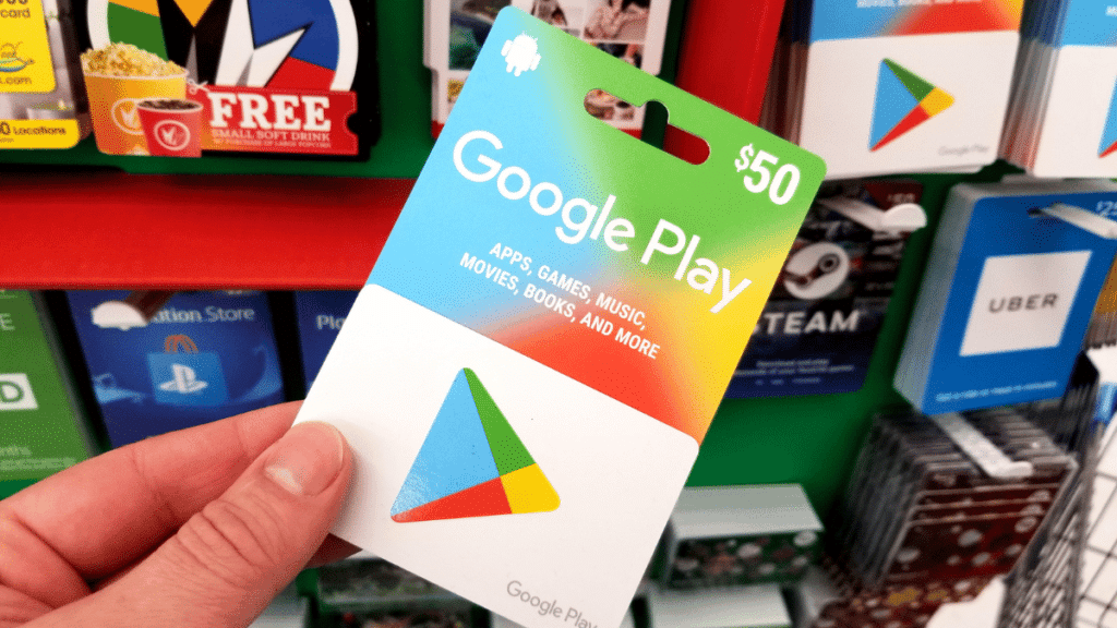 Man holding free Google Play credit gift card